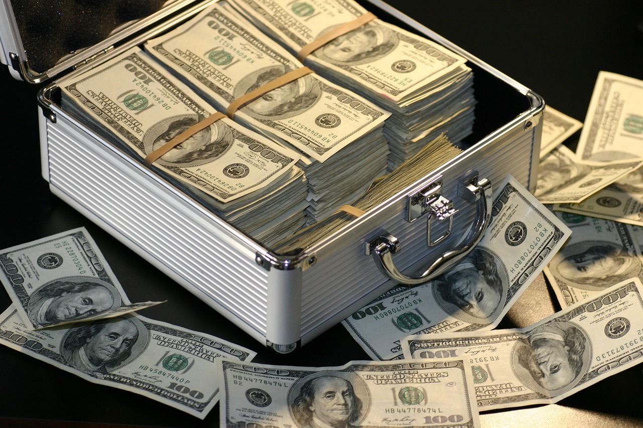 Open Aluminum Attache Case With 100-Dollar Bills